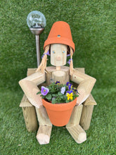 Girl or boy sitting on a chair with solar light